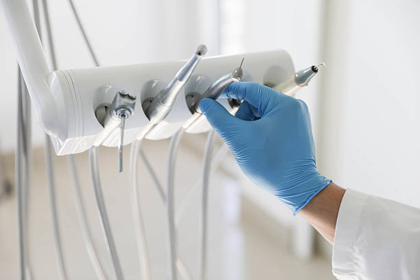 Professional Root Canal Treatment technician working in Rockville Centre, NY